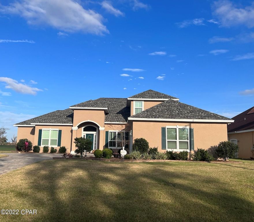 Beautiful custom built Country Club Home located on the First Fairway.  2 car garage with separate golf cart entrance.  Master Suite downstairs.  2 bedrooms on first floor, two on second floor.  2 additional rooms on second floor with closets that could be used as bedrooms.  All windows are Schwinco 9000 Dominator Impact Windows installed July 2018 before Hurricane Michael, windows have a 30-year transferable warranty.  Modern stainless-steel appliances, Granite in kitchen and bathrooms.  Make an appointment today to see beautiful home.  PLEASE VERIFY ALL INFORMATION AND MEASUREMENTS..