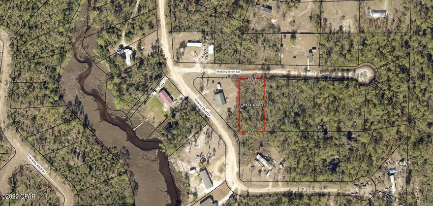 Lot 2 Hickory Bluff, named for the trees and high and dry land, here is a building lot, ready for a new construction or mobile home. Surrounded by new homes and a short distance to Fanning Bayou, fishing, boat ramp and just a few miles from Lynn Haven. The lot has with no association fees so bring your boat, RV, build a pole bar or workshop. Peaceful, quiet and ready to go today! Lot next door is for sale as well or choose from any of the 50 lots we have for sale in Hickory Bluff community! Call for additional details.