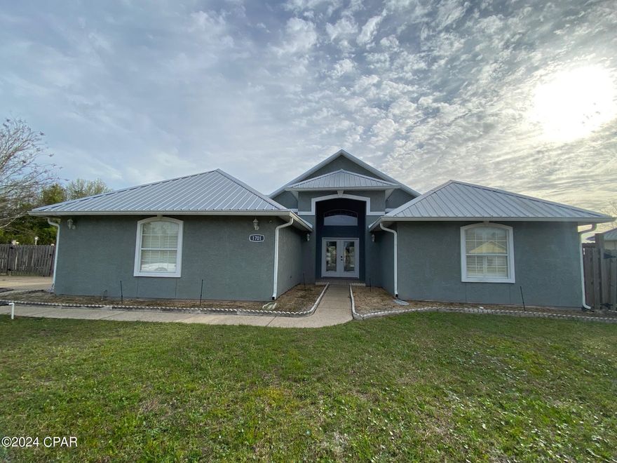 LIKE NEW 3bd 2ba 1,707 sqft - but with a heated and cooled garage that adds another 500sqft - Executive home with an in-ground salt water pool at the end of a cul-de-sac in Mowat Highlands. Metal roof, new LVP flooring, new interior paint, recessed lighting, plantation shutters, security cameras. Mbath has walk-in closet, garden tub & double shower. Covered back patio, privacy fenced. 2 car garage with tons of cabinets/storage space. Washer/dryer included. **Pool service and Landscaping included; note - cannot use fireplace** Pets negotiable, restrictions & pet deposit apply. EMAIL OFFICE FOR RENTAL REQUIREMENTS AND SHOWING INSTRUCTIONS, DO NOT CALL AGENT. Rentals@crpm850.com