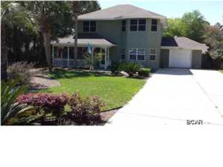 This beautiful home has been completely remodeled with custom woodwork and hardwood floors. Beautiful molding throughout...living and dining areas have beautiful chair rails and there's lots of storage! Formal dining room has a closet and can be used as a 4th bedroom. Kitchen offers pass through window to the tiled family room. Horizon Florida Room with tinted windows, features tile floors and ceiling fans and overlooks beautiful back yard. Master bedroom upstairs features a bay window, charming areas to display your collectibles and large walk-in closet. Second and third bedrooms are upstairs and one features a large walk-in closet. All the door and window frames have been handcrafted by the current owners. 24x30 workshop features single car garage. Age, SF and room sizes are