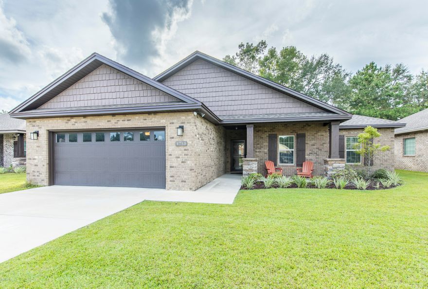 LOVELY 4 BEDROOM 2 BATH HOME WITH ALL THE CUSTOM FEATURES! This open split bedroom floorpan offers the great  combination of hosting guest and entertaining! The family room is open to the kitchen and dining room. The Master Suite offers a tiled showered with dual vanities, soaking tub, private water closet and walk-in closet. The additional 3 bedrooms have a guest bath with dual vanities, tub/shower combo with a linen closet. The main living area of the home features wood-flooring and tile and the bedrooms only have carpet. The kitchen features custom built cabinets with granite, stainless steel appliances, pantry and a large laundry room with storage just off of the kitchen going into the 2 car garage. Great Schools and Close to TAFB!! Don't miss out on this like new home!!