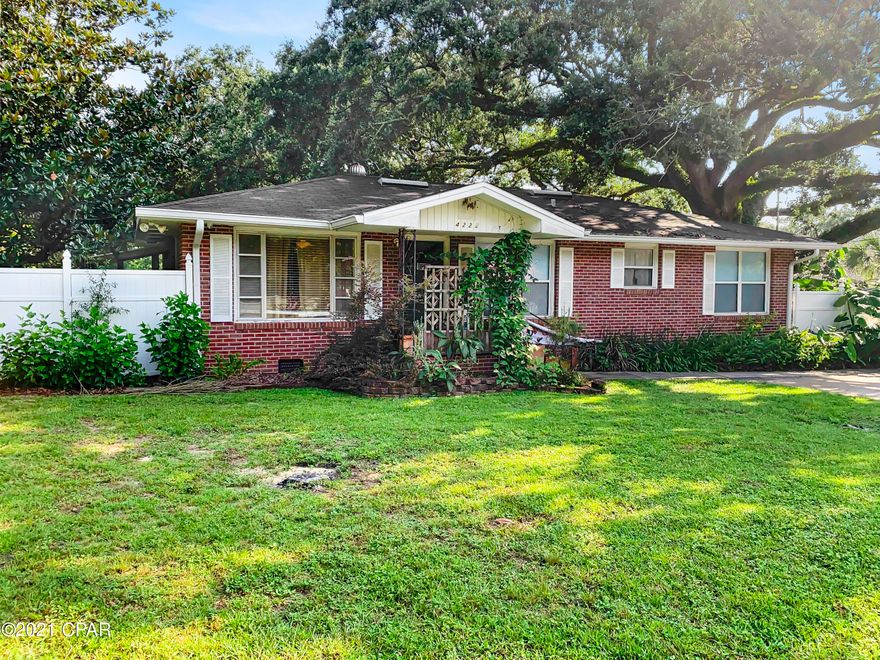 With  Commercial zoning, this property makes working from home is a reality! A truly unique find in East Pensacola on over a half acre near the intersection of Spanish Trail and Creighton Rd.  This home has character and would make a viable Air BNB, an office space, a store front, or even a salon. If your looking for character, you found it. The beautiful hardwood floors run throughout the main living area and bedrooms in this quaint 3 bedroom 2 bath home. Entering in the mid-century front door, you'll find the charming living room that leads to the eat in kitchen and then into a very large Florida room with tile, that is heated and cooled and a gorgeous tongue and groove wood ceiling. Wiring replaced a couple of years ago, AC and water heater replaced Dec. 20. With the character of the 60's, you also have modern amenities with a new A/C unit updated wiring, newer water heater and stainless in the kitchen.  Seller recently had foundation repaired and it comes with 25 year transferrable warranty with Alpha Foundations. Inside wall/ceiling has had repairs and newly painted. 

The large back yard has lots of potential to offer and comes with a garage toward the entry into the backyard and a newer storage building that is spacious toward the back of the property. On the back of the home you'll find a carport with a separate building for washer and dryer. This might be just the right find for someone looking to work and run their business from the same location. Don't miss it! Please verify all commercial ventures and measurements, if important.