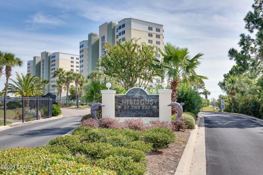 Welcome to the best kept secret on the Bay. This beautiful community includes boat slips and garages for sale or rent, jet ski slips, over 400' fishing pier, grilling stations, tennis basketball or pickleball court, fire pit, and a walkway/stairs into the gulf for your paddle board or kayak, plus much more! Step inside this amazing condo and you will immediately notice the upgrades: extra security French doors in the foyer for safety also to ensure a pet  won't dart out; Remote controlled hurricane shutters on the water side; custom made room darkening shade; insulated draperies, plantation shutters; Custom 3/4'' all wood shaker cabinets in kitchen with quartz countertops- including slide-out shelves in all bases; Stainless steel appliances with electric cooktop and built-in oven & microwave; built in 3 door refrigerator; dishwasher with 3 sliding shelves; Farmhouse double sink; Pendant lights; Newer HVAC with hepa filter & heat pump with networked programmable thermostat; Water heater replaced; Custom trim and wainscoting; Whole house surge protector and Water filter; Stackable Washer/Dryer, pantry and storage area in kitchen area.  The large primary bedroom features trey ceiling; new sliders with a spectacular view of the sunrise on the bay and ensuite with double vanities and quartz counter tops; separate venetian marble shower; garden tub with tile surround and spacious closet with built-ins. The Great Room features the new hurricane rated sliders with another fabulous view of the bay. The secondary bedroom features a spacious closet; plantation shutters and a full bath with large shower just steps away! This amazing home also features LVP flooring throughout; and fresh, custom paint. The community completed the Structural Integrity Study and invested millions in improvements with no extra costs to the residents. The buildings have been completely resurfaced and repainted including the walk ways. The amenities also include a work out gym, community room for parties/get togethers, and a peaceful library for working or reading at no extra cost to residents.  The no short term rentals make this community a more relaxed/serene lifestyle with an atmosphere of unity and long term friendships. The HOA includes water, garbage, pest control, high speed internet with over 200+ tv channels, gated entrance and cameras for security.  If the amenities and welcoming atmosphere don't draw you in - the awesome sunrises and water life will - including dolphin, redfish and mullet.  It is truly an exceptional place to live!