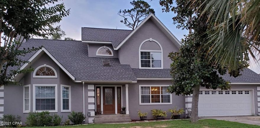 Move to Florida and enjoy this beautiful custom-built 2 story home! Located in the heart of Panama City, in a lovely neighborhood on a cul-de-sac. This home has four bedrooms and includes two and a half baths. The master bath is a dream! It has an oversized shower that includes a built-in bench, with three shower-heads and one is an oversized rain head. The upstairs master bedroom has a balcony, and overlooks the fenced in backyard. The bonus room has built-in cabinets and drawers, and holds the upstairs laundry room. The oversized 2 car garage has space for a large work bench. The kitchen is a chef's dream. This home is located a few miles from Panama City Beach, is a short drive to several boat landings, walking distance to Winn-Dixie grocery store, and only 2 miles from the Hathaway Bridge, Gulf Coast State College, and the FSU P.C. Campus.

The Florida Coastal Life is calling, and this home is MOVE IN READY!