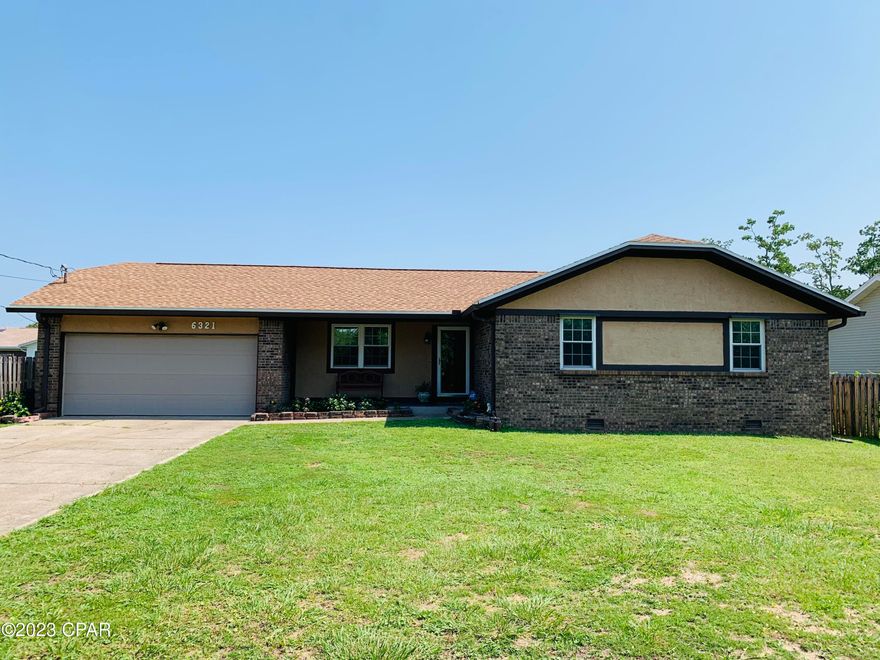 Come see this super clean well cared for home in Callaway.  This beautiful home is located just a short distance to Tyndall Air Force Base and only 30 minutes to Panama City Beach.  You will love the open floor plan with the spacious living room that features vaulted ceilings, brick electric fireplace,  bamboo floors and smart thermostat. The separate den will give you that added living space and the formal dining room will accommodate a large dining table and china cabinet.  The lovely kitchen features oak cabinets, granite counter tops with breakfast bar, flat top stove, tile backsplash and double refrigerators.  You will love the new tinted double paned windows that have built-on exterior storm shutter holders.  The home has an elegant feel with crown molding, lots of space and a built-in security system.  The office has been converted into a very large master bedroom closet.  This room could easily be an office, hobby room, exercise room, 4th bedroom or left as-is.  Enjoy your evenings on the covered back deck with privacy fence back yard and 8x10 workshop.  The home feels much larger than what the square footage states and offers more than most homes on the market in this price range.