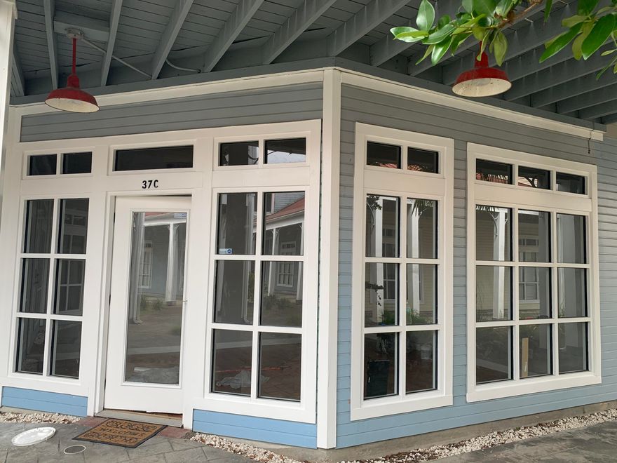 *COMMERCIAL OFFICE* Great downstairs unit located at Promenade Mall, a Key West themed business office complex just 1 mile west of Hathaway Bridge, convenient to Panama City AND Panama City Beach. 

New Paintwork, Flooring and fixtures. This office is aprox 1000 sf, has 3 large offices, a beautiful reception area with lots of windows overlooking the courtyard and fountain, and a kitchen area.  Unit also has front door and back door entrances. Rent includes water/sewer/garbage and CAM fee

$1600 a month plus sales tax.