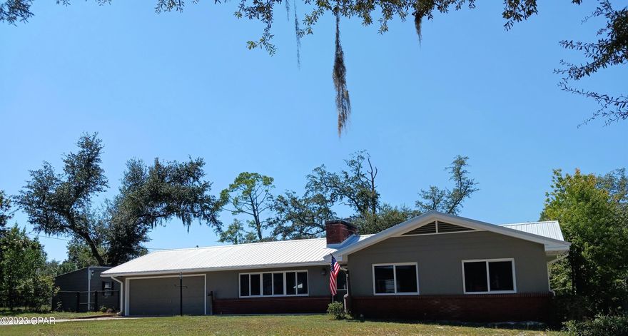 WATERFRONT 1 ACRE 2 LOTS Motivated Seller!!  Corner lot on beautiful Parker Bayou with Deepwater access to the Bay & the GULF of Mexico!  Over 170ft of waterfront next to a public boat launch....this is a dream property!!   
Best price for Waterfront.  Right around the bend from Rodeos Steakhouse. Strong Cinder Block home with Stucco and hardie board exterior, Oversized Garage with utility rooms for an awesome extra storage space PLUS an additional outbuilding AND a New Roof!  Your new home has ALL NEW windows & doors, New HVAC, New Metal Roof NEW Romex witing & New Stainless Appliances & granite countertops..ALL since 2019.  Your new home provides you with 3 bedrooms, 2 baths, hardwood flooring, a brick fireplace, tiled bathrooms & a fabulous open floor plan in your living/dining area and kitchen.  You are sure to enjoy amazing views of Parker Bayou from the kitchen, master bedroom & master bath, but that doesn't compare to living on the incredible 1 acre waterfront property.  Our marvelous home sits high on the hill and it is equipped with gutters all around that have drain lines in place to redirect water away from the house.  This home was built in 1963 and has an effective date of 1993 with reroof and remodel in 2019.  The decorative beveled front door warmly welcomes you and guests alike.  The sliding glass backdoor provides an unobstructed view of Parker Bayou.   Survey & elevation cert available. Roof receipt and Sellers Disclosure available.  While the location is super convenient to TAFB, shopping, restaurants, churchs, schools, etc., it boasts a feeling of tranquil living that you & your family are sure to cherish!  All information is true and accurate to the best of our knowledge and should be checked for accuracy.