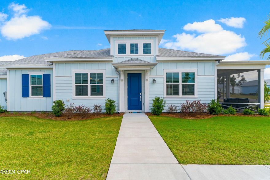 Aloooooohaaaaaa!  The most popular large cottage in Latitude Margaritaville Watersound is move-in ready.  Come join all the Buffet fans as you live your best life in America's most sought after 55+ community.  You'll love the extra lot size with an abundance of green space in the front and side of the house  as you enjoy the Florida warmth from your screened in porch with a serene view of the beautifully landscaped seating area directly across from the home.  The interior of the Aloha is gorgeous with beachy tile flooring in the common areas and upgraded carpeting in the bedrooms.  Did you know that carpet is an exceptional sound absorber?  It can reduce the sound of walking by 25 to 34 decibels — whereas laminate flooring reduces surface sounds by only 1 to 6 decibels. Consider it a gift to your neighbors.  You'll enjoy the subtle luxuries of the many other upgrades throughout the rest of the home like quartz countertops, custom paint, gas range and exquisite lighting and fans as well as 42'' grey cabinets donned with crown molding and a beachy blue glass tile backsplash.  A very cool retractable door has been added to the den to provide your extra guests with privacy.  You'll love the splashy listello accent in the tiled to the ceiling shower of the master bath.
The 2-10 Warranty is transferrable to the new homeowner. The home is unbelievable but wow...Latitude Margaritaville is the most sought after 55+ community in the country right now with unmatched amenities including a private restaurant with 3 bars, resort pool, live music daily, pickleball, bocce ball, cornhole, putting green, Fins Up Fitness Center, indoor lap pool & whirlpool and a full lifestyle staff who dedicate their days to ensuring your fun! Phase 2 of the amenities include a full size theatre, Barkaritaville dog spa, woodworking shop, business center and community rooms for clubs, groups, tastings and food demonstrations. The public retail has also begun with the golf cart store in full swing, a bank has just broke ground and anticipating the Publix grocery store, restaurants and other boutique shopping soon as well as a Public Marina...all through St Joe!