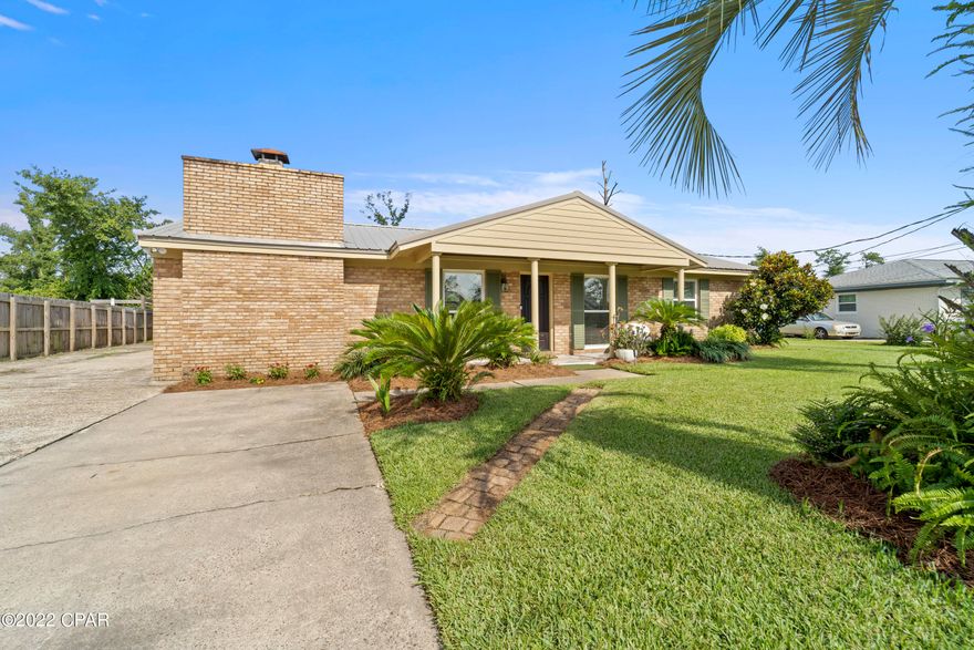 Must See! Beautifully renovated home, centrally located with 3 bedrooms, 2 baths and a bonus room. Updates include metal roof, windows, newly painted interior, kitchen counter tops, luxury vinyl plank flooring, glass shower enclosures with tiled showers, lighting, fixtures, and hot water heater. The kitchen features stainless steel appliances, custom built cabinetry and new quartz counter tops. If a spacious master bedroom is what you need, then this one is for you. Features his and hers walk in closets and a great covered patio. Bonus room for an office, nursery or sitting area. Beautiful backyard oasis with plenty of privacy for entertaining family or just enjoying nature.  Detached garage/workshop and open parking for your RV or boat. Owner is a licensed real estate agent.