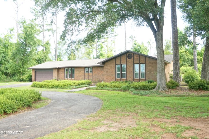 Comfortable elegance right on the edge of town with beautiful Oak trees throughout the front yard.

Recent updates include complete kitchen renovation with a convenient laundry area. The spacious kitchen/family area has a beautiful fireplace. The back covered patio has a TV hookup and a view of a spacious private back yard.  This is a great home that has a large yard and very convenient.