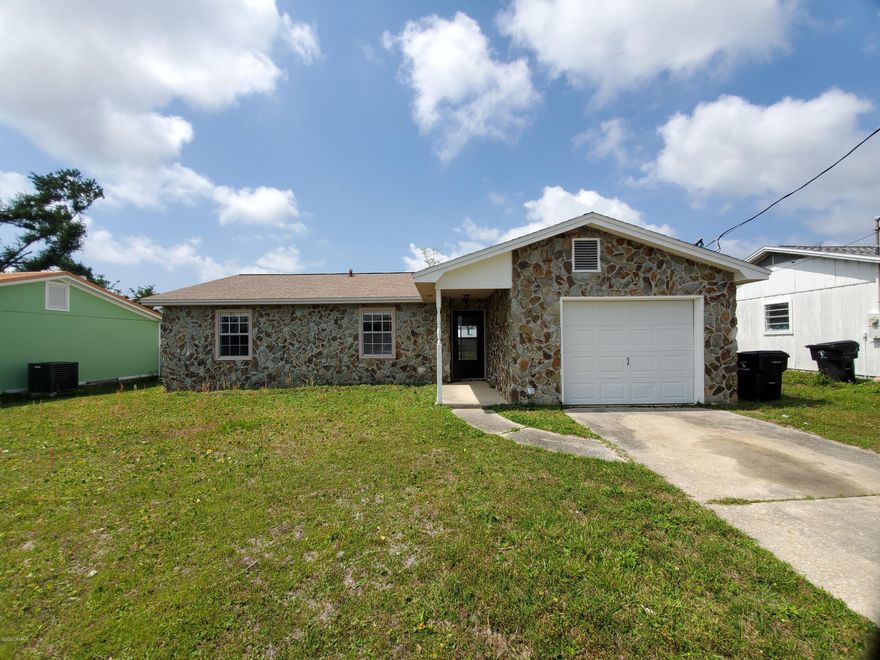 Great first home or investment opportunity! The 3 bedroom, 2 bathroom home was freshly painted and move in ready. Features a large living room with vaulted ceilings and wooden accent beams. The kitchen includes all appliances and tile floors with a bay window in the eat-in area. 1-car garage just off the kitchen; Carpet flooring in the living room and bedrooms; The master bedroom overlooks the back yard and has an attached bath with tub/shower combo. Spacious back yard!