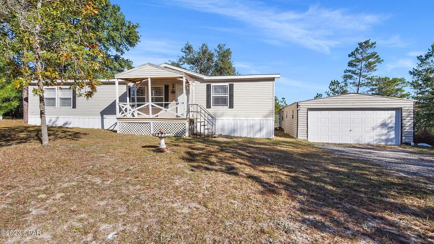 CURRENTLY UNDER CONTRACT, SELLER WILL CONSIDER BACKUP OFFERS - MOVE-IN READY HOME PLUS GARAGE AND WORKSHOP - 1.34 ACRE PROPERTY! The interior of this well maintained home features 3 bedrooms, 2 baths, a semi-open floor plan with split bedrooms (great for entertaining), a spacious living room with fireplace, ample natural light, and an interior laundry room.  The dining room is open to the kitchen which boasts plenty of counter and cabinet space, white appliances, and an XL walk-in pantry. The master bedroom has a walk-in closet and can accommodate King Size furniture. The adjoining master bath has a soaking tub, double vanity, and separate shower. The other 2 bedrooms have walk-in closets and share a hall bath with shower/tub combo. The exterior features a newer roof, an easy maintenance exterior, a covered front porch, a detached 2 car garage with an adjoining workshop, and a back open and covered sitting area. Come live the quiet life in a country setting yet be around 15 minutes to town! Call today for a private preview. Measurements approximate.