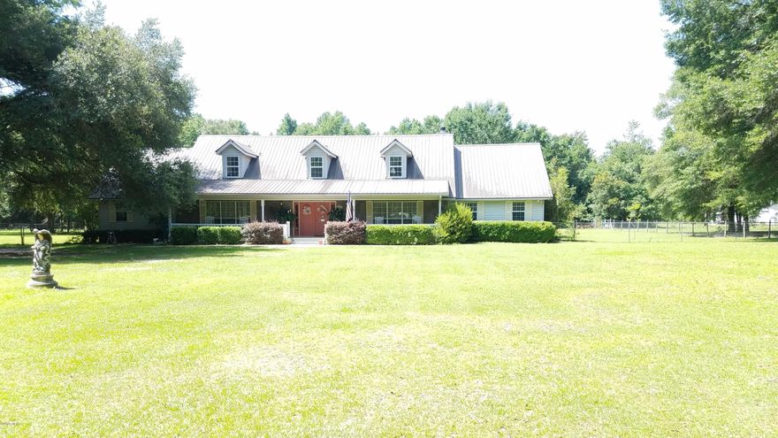 CURRENTLY UNDER CONTRACT, SELLER ACCEPTING BACKUP OFFERS. HUGE four bedroom, two and a half bath home with ample living space AND storage!! This two story home features a split floor plan with master suite on the bottom floor. The master features a spacious bathroom with a garden tub and a separate dressing room with attached closet! On the second floor you will find three additional bedrooms and a full bath, of which one has a great walk-in closet. There is also easy and spacious access to the attic on the second floor. Out of the gorgeously landscaped five acres, the back yard is completely fenced. 2 New A/C units in 2017. Owner has current survey,

two new wells in 2008, roof replaced 2012 and new roof screws in 2018. This is one to see right now! Perfect for the large or growing family