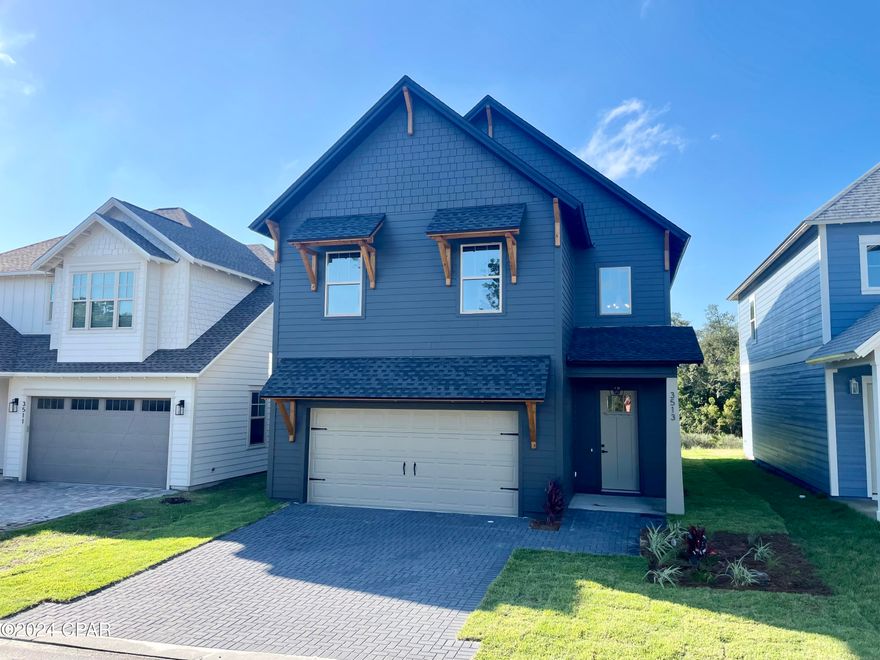 NEW CONSTRUCTION IN ONE OF THE MOST BEAUTIFUL GATED COMMUNITIES IN BAY COUNTY, SANCTUARY BEACH!!!!! This home features an open concept living space for smooth transition from room to room & to the outdoors. Enjoy the Quartz countertops placed on top of your beautiful white shaker soft closing cabinets, double vanities in the master bath w/ an oversized custom floor-to-ceiling tile shower & extra large walk in closet that leads into your laundry room. Equipped w/ beautiful stainless steel appliances, pot filler above range, kitchen island, Butler pantry, luxury vinyl plank flooring, 10' ceilings in your main living area, 2-car garage w/ brick paver driveway, mud room, electric fireplace, irrigation & covered back patio w/ ceiling fan. Best part is... no neighbors behind you, w/ plenty of greenery & an association only shared POOLl!!!