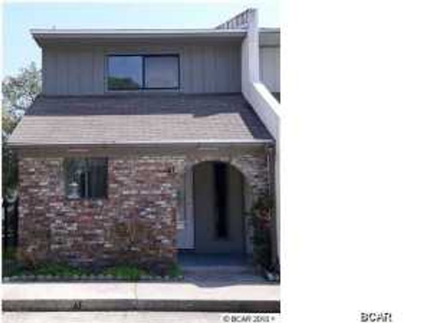 INCLUDES DEDICATED BOAT SLIP! This town home has 2 full baths upstairs and 1/2 bath down stairs. It has been extremely well maintained and completely renovated within this past year. Updates include new carpet, new paint throughout, new kitchen cabinets, granite counter tops, new dishwasher, new sink and new tile in laundry room. This a great community to live in, whether as a full time resident or just a beach getaway. The subdivision fronts the bay, and with your own dedicated boat slip, you have access to the entire gulf from your back yard! There is very little exterior maintenance needed. The back yard has a lot of potential if you are looking to create a relaxing private space. This unit offers an enclosed sun room from the upstairs master bedroom plus a lower enclosed patio off