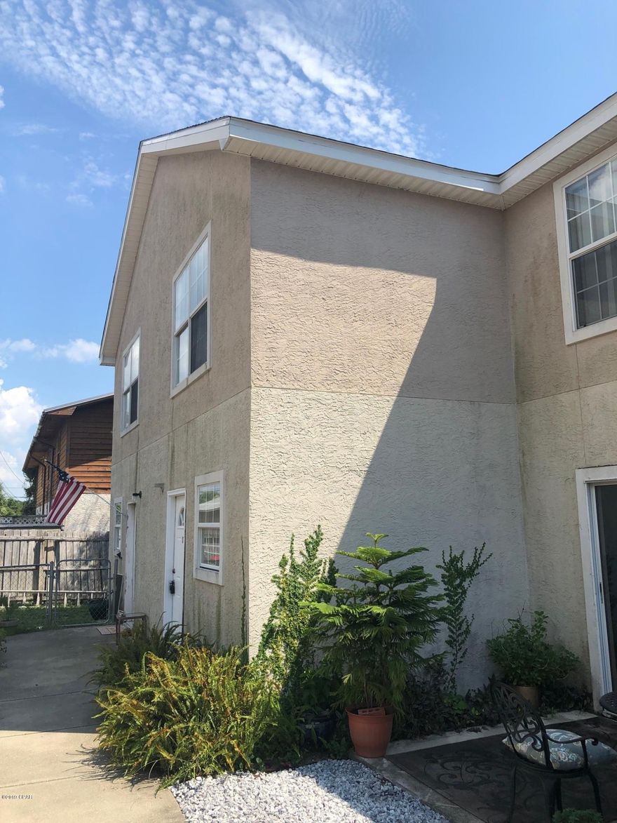 For rent! Unfurnished, 2BR/1.5BA and within walking distance to beach access! Town home style design with living space, kitchen and half bath on first floor. Bedrooms and jack-and-jill bathroom on second floor. Property has been freshly painted throughout! Washer/dryer included. No pets. Rent includes trash.