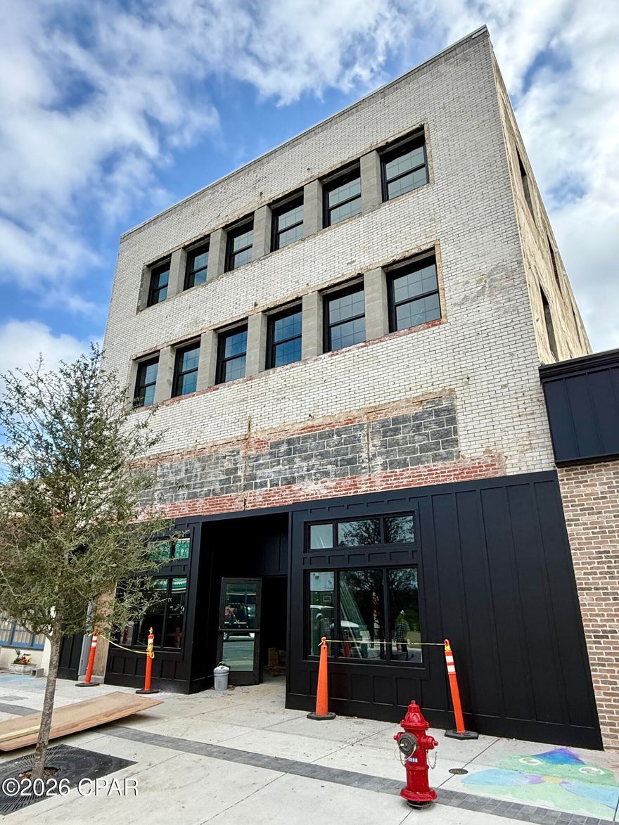 *The Mashburn Building | Historic Downtown Panama City*

Experience a new chapter in Historic Downtown Panama City with The Mashburn Building--a signature four-story development designed to elevate urban living while honoring the character of downtown. This landmark project brings together modern luxury, industrial design, and the energy of a walkable city lifestyle.

The third and fourth floors will feature distinctive industrial-style residential lofts, thoughtfully designed for both investors and those seeking upscale downtown living. Each residence showcases nearly 12-foot ceilings, polished concrete floors, and open, contemporary layouts that highlight the authentic character of loft-style spaces.

Construction is currently underway, offering a rare opportunity to secure a residence in one of the area's most exciting revitalization projects, with an anticipated completion in April 2026.

Step outside and enjoy immediate access to the vibrant atmosphere of Harrison Avenue, where boutique shops, art galleries, coffee houses, breweries, and entertainment venues create a dynamic downtown experience just steps from your door.

Blending timeless architecture with modern design and community-centered living, The Mashburn Building is poised to become one of Downtown Panama City's most sought-after addresses.

Reserve your loft today.

*Disclaimer:* The renderings provided are for illustrative purposes only and may not represent the final product. Certain features, finishes, and details shown may include optional upgrades that are not included in the standard offering. Actual specifications, materials, and layouts may vary. Please consult with the builder or sales representative for complete details regarding available options and standard features.