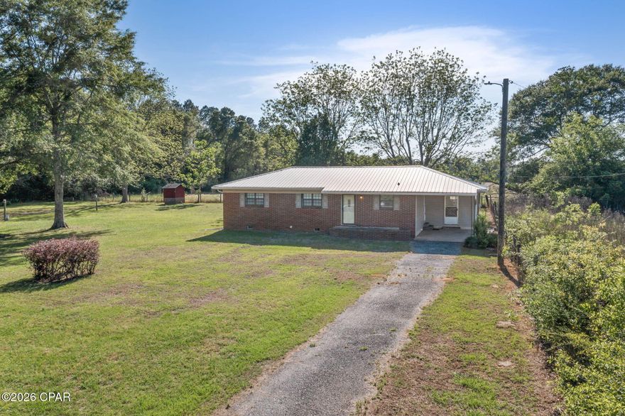 Charming Country Brick Home -- 2 BR, 1.5 BA located minutes from town.

Updated and move-in ready single-story home on a beautiful 1-acre lot. Bright kitchen with abundant cabinets, generous counter space and a breakfast bar; adjacent dining room for everyday meals. Large living room and two nicely sized bedrooms.

Exterior & outbuildings:
- Concrete-floor carport that doubles as a covered patio
- Workshop with lean-tos -- great for mower/yard tool storage
Additional front carport w/ adjacent dedicated washroom/storage 

Comfortable area for country living. 

 Property has plenty of room for a vegetable garden or a flower garden.

 Would be perfect for a starter home or downsizing option.