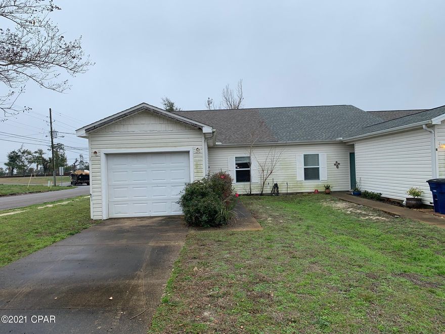 End unit, single story townhome! Roof has been replaced! Home features an open floor plan! Spacious living room is open to kitchen & dining area! Kitchen features white cabinets, white appliances, plenty of counter space, pantry, & tile floors into the breakfast/dining area! Easily accessible washer & dryer closet! The home has two bedrooms & two full bathrooms! Covered rear patio for relaxing! Only a half a mile from the shore! A must see! Terrific unit, ready to be put back together! Submit your offer today!