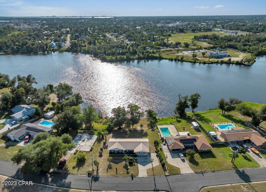 Super Deal on Waterfront Home!! Great Opportunity to buy this Updated home. All updates were completed in 2019-2021-Brick Waterfront home on Lake. Oversized Driveway to hold your boat or RV. 

Non mandatory flood zone.

Wont last ....100% Move in ready! 

Updates: Kitchen and Baths, Wiring, Metal Roof ,fans and lights, Newer AC, Newer hot water heater, etc etc .. To many details to list.