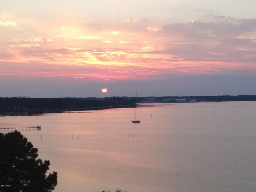 This desirable END PENTHOUSE UNIT on the 8th floor at Magnolia Bay Club avails itself to UNOBSTRUCTED VIEWS of St. Andrews Bay in Panama City Beach. This lovingly maintained and NEVER RENTED unit features a large Bay front living room lined with windows which showcase stunning views. Furniture negotiable.  The Bay front master bedroom features a large walk-in closet, a luxurious bathroom with an oversized jetted tub and access to the large balcony. Two large guest quarters and a spacious den, Magnolia Bay Club is a gated community located south of highway 98 and is only a short drive to our renowned sugar sand beaches. Amenities of Magnolia Bay Club include enjoyable indoor and outdoor activities such as swimming the large crescent shaped pool. Grilling beneath the large concrete pavilion from the wooden pier. Easily store your kayak along the beach in the designated storage area. The first floor incorporates a bay view fitness center and a large community room with a kitchen area and billiard table.
PET FRIENDLY...