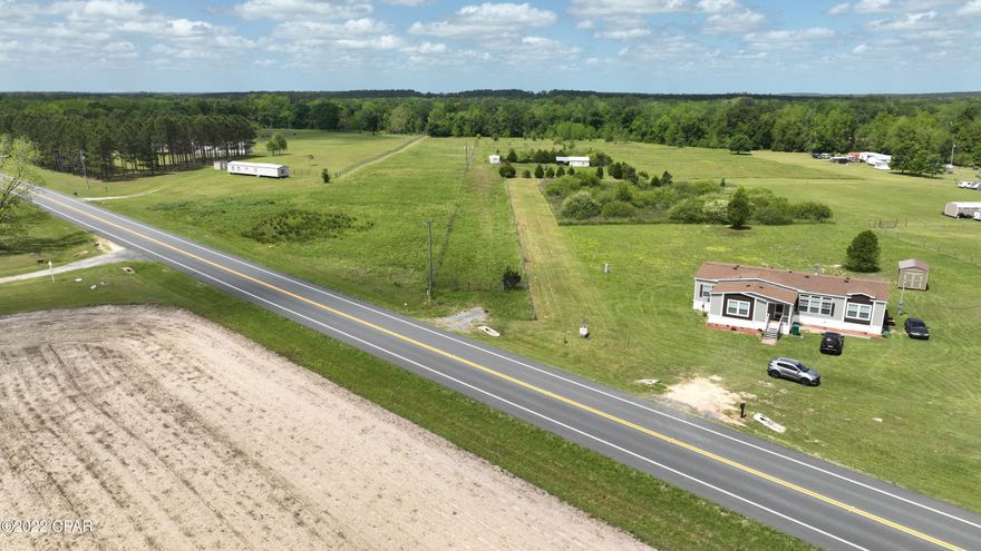 5.55 acre parcel located just off of a paved road.  At this property you are a centrally located to Highway 231 which would provide access to both Dothan and Panama City.  This property is cleared and features a workshop.  Would be a great place for a homesite!