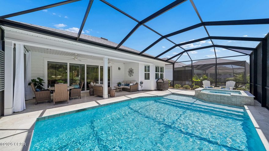 Welcome to this thoughtfully appointed Cabana Bay model on a preserve lot, located in sought-after Phase 3 of Latitude Margaritaville Watersound, a short golf cart ride to the vibrant Town Square where activities abound. This meticulously maintained move-in-ready home is where modern elegance meets coastal charm. Inside this light-filled, open-concept layout you'll find a gourmet kitchen full of upgrades featuring quartz countertops, a gas cooktop, (kitchen fridge conveys), wall oven, microwave, wine fridge, under cabinet lighting, and range hood perfect for entertaining around the oversized island that easily seats 6. The living room abutting the dining area features ceiling beams and expansive glass slider doors that open to your outdoor oasis. The large primary suite features his/her closets while the ensuite bath offers dual vanities, quartz countertops and a zero entry tiled shower. Two additional bedrooms are separated by a tasteful bathroom with tiled shower/tub combination. The home also features a den/flex space with built-ins perfect for an office, guests, or additional living space while the laundry room offers upper cabinets for all your laundry items. Fire up the grill and entertain in your private oasis pool area featuring beautiful Travertine pavers, recently sealed, and newly installed metal panels offering additional privacy. Other mentionables to note are plantation shutters, crown molding in the living areas, 5 ½'' baseboards, a whole house water filtration system and newly epoxied garage floor. HOA fees include lawn care and landscaping allowing you more time for fun. Residents of Latitude Margaritaville Watersound enjoy world-class amenities including: a bandshell with music Friday and Saturday nights, Paradise Pool, Bar & Chill restaurant with 2nd floor Overlook Bar with views of the Intracoastal Waterway, fitness center with indoor lap pool, pickleball, tennis, basketball and bocce ball courts, Workin' N' Playin' Center featuring a dog spa, theater, woodworking shop and arts & crafts studio, dog park, daily activities, concerts, events, walking/biking trails and golf-cart friendly paths. You'll be just minutes to a new public marina, Publix, shopping, dining, nail salon and much more currently being built for even more convenience while just down the road a few miles is the new FSU/TMH medical campus with a new hospital currently under construction. Find your slice of paradise here and start enjoying resort-style living in this premier 55+ community, approx. 7 miles to the sugary white sand beaches of the Gulf!