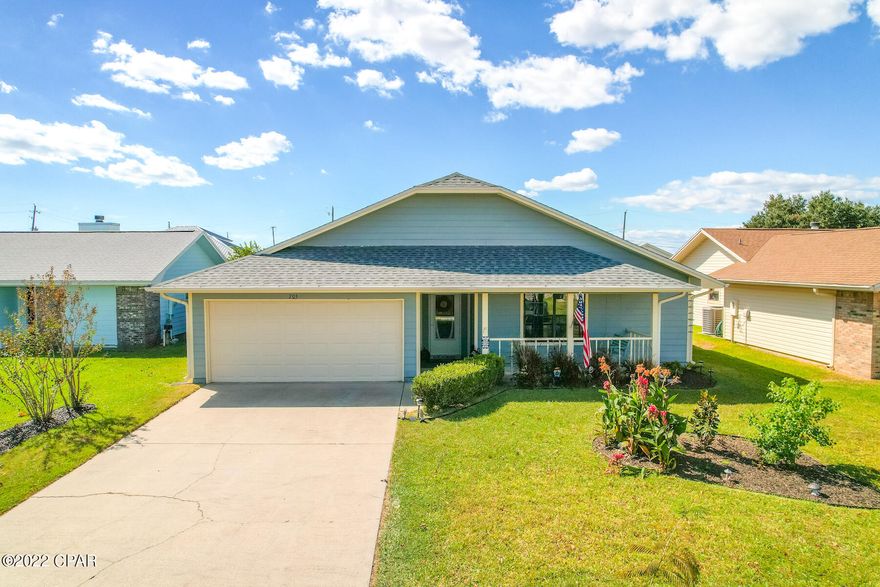 CURRENTLY UNDER CONTRACT, SELLER WILL CONSIDER BACKUP OFFERS Quiet neighborhood close to everything!! Charming, well-kept 3bd/2bth, 2-car garage with sun room near TYNDALL AFB and Walmart. Interior boasts beams in the cathedral ceilings of living room and primary en suite, wood look tile flooring throughout, and updated kitchen with new appliances (2022). Living room showcases exposed brick with wood-burning fireplace leading you into eat-in kitchen. Adjacent to the kitchen is the spacious, well-lit Florida room that leading to the fenced backyard. Living, dining, master, & guest bath being repainted 10/17.  All sizes/info/measurement approx; please verify if important!