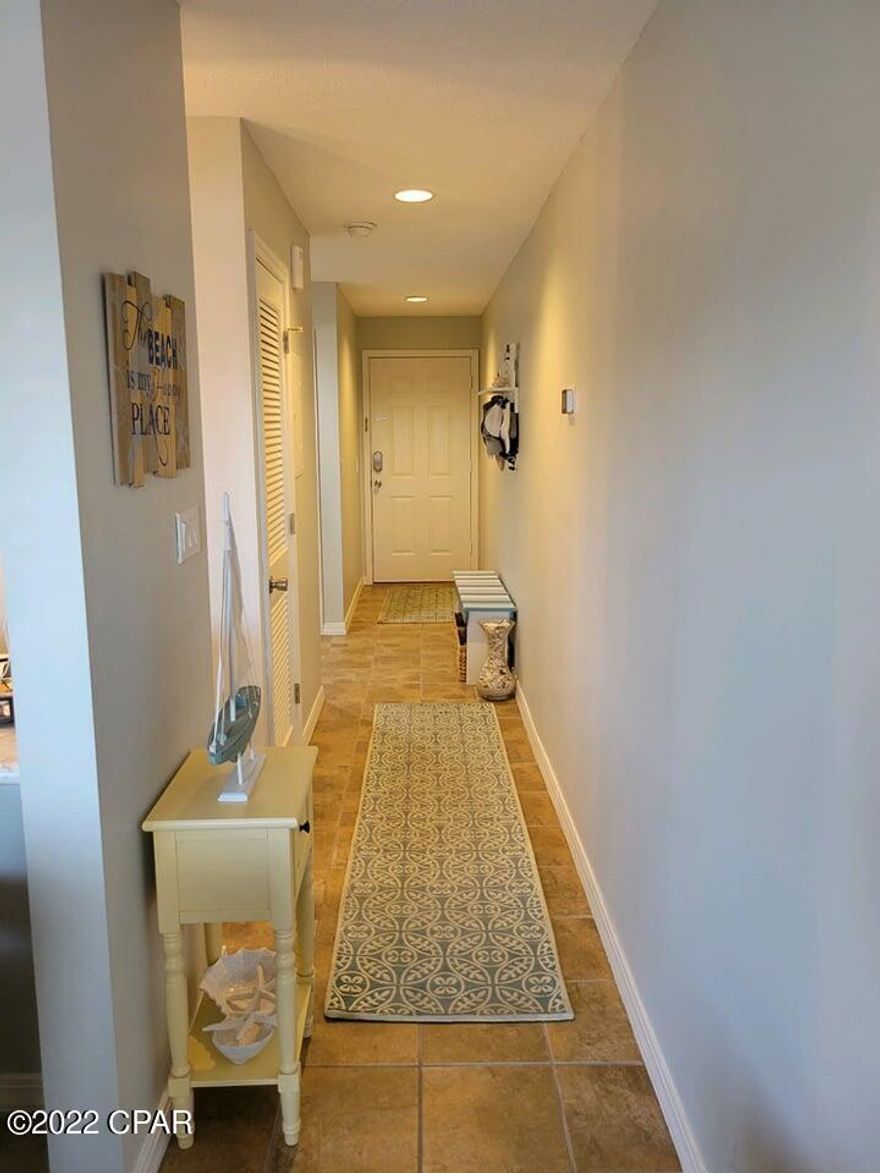 Walk the beach EVERY DAY while enjoying ownership of this clean as a whistle ENDLESS SUMMER condo on the west end of the beach.  This amazing 1 bedroom 1 bath  condo is literally steps from the World's Most Beautiful Beaches!   The interior is nicely renovated and comes fully furnished, all you need to bring is your beach clothes and ENJOY.  The homeowners association fees are lower than most condos in Panama City Beach making this the perfect home, second home or turn key rental.  Rental business just keeps increasing with this area being a poplular tourist spot.  Pier Park, shopping, restaurants and the international airport are all very close by.  Call your Realtor today!!