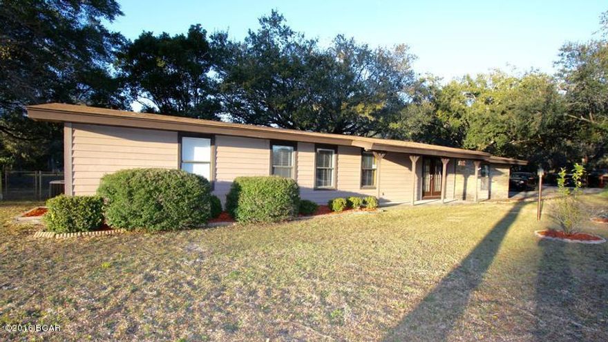 HomePath Property MOVE-IN READY! Beautiful corner lot with a canopy of large oak trees. Home has been remodeled in the last few years and boast large family room with a step down to one section. LARGE Master Bedroom on one end of the home completely separated from the other two bedrooms. Garage is also separated with wall in between. Great workshop area on one side but room for a car or your motorcycle in the other side. Plenty of paved area in the driveway for up to 4 additional vehicles. The back yard has a covered patio area and a fenced backyard for a safe place for the pets. Age, Square Footage, and room sizes approx, if important please verify.