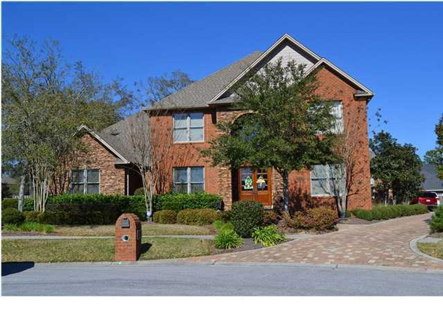 This custom built 5 bedroom, 7.5 bath home is located in the desirable Meadows subdivision. Enter into the grand two story foyer with curving stairwell, and unique lighting features. The custom kitchen has granite countertops, Wolf appliances, SubZero refrigerator, separate icemaker, double drawer dishwasher, pot filler, the list goes on. Besides the breakfast bar and large island with mosaic tile sink, and large breakfast dining, there is a formal dining room. The great room with trayed ceilings downstairs has it's own wine room/bar with dual control 126 bottle wine fridge There is a large downstairs laundry room, mud room with custom built ins, more. Master suite is large, his and hers vanities, closets with built in shelving. There is an additional bedroom downstairs. Upstairs