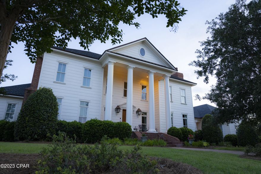 Welcome to 3517 Dragons Ridge Rd, a stunning piece of paradise nestled in the heart of Panama City Beach. This remarkable property offers an exquisite blend of luxurious living and serene natural surroundings, providing an unparalleled lifestyle opportunity for those seeking the ultimate coastal retreat.

Situated on a generously sized lot(.64 acres), this magnificent residence boasts breathtaking curb appeal, with its elegant, traditional architecture and meticulous landscaping. The beautifully designed exterior showcases a harmonious fusion of modern sophistication and charm, creating a welcoming ambiance from the moment you arrive.

Step inside this architectural masterpiece and prepare to be captivated by the sheer elegance and meticulous attention to detail. The spacious floor plan seamlessly integrates the living, dining, and kitchen areas, allowing for effortless flow and easy entertaining. Sunlight floods the interiors through large windows, illuminating the space and creating an inviting atmosphere.

The gourmet kitchen is a chef's dream, featuring top-of-the-line Wolf and Sub Zero appliances, custom cabinetry, and a center island. Whether you are hosting a grand dinner party or enjoying a casual meal with loved ones, this culinary haven is sure to impress.
Retreat to the luxurious master suite, where tranquility and comfort await. The master bedroom provides a private sanctuary, complete with a spacious layout, warm flooring, and a serene color palette. The en-suite bathroom is a spa-like oasis, boasting a deep soaking tub, a separate walk-in shower, and dual vanities adorned with exquisite finishes.

The additional bedrooms are equally impressive, offering ample space, abundant natural light, and well-appointed en-suite or adjacent bathrooms. Each room has been thoughtfully designed to provide privacy and comfort, ensuring that every resident and guest feels right at home.

The outdoor living spaces are a true highlight of this exceptional property. Step onto the expansive patio area and be greeted by breathtaking panoramic views of the surrounding natural beauty. Whether you choose to lounge by the sparkling swimming pool that can be heated or cooled, indulge in al fresco dining, or simply soak up the sun, the outdoor oasis offers endless possibilities for relaxation and enjoyment.

Every detail has been considered. The property has an 80KW generator on a transfer switch, Cresto lighting system, A/V system, allergy filtration and dehumidifiers on the house air-conditioning, golf cart garage and storage, storage, storage. 

Located in Panama City Beach, this residence offers convenient access to a myriad of recreational activities, including pristine beaches, world-class golf courses, and an array of water sports. Additionally, nearby shopping, dining, and entertainment options provide convenience and entertainment at your fingertips.

Don't miss the opportunity to own this remarkable piece of real estate at 3517 Dragons Ridge Rd. With its exceptional design, luxurious features, and prime location, this property is truly a dream come true for those seeking a coastal paradise. Schedule your private tour today and prepare to embark on a new chapter of elevated living.