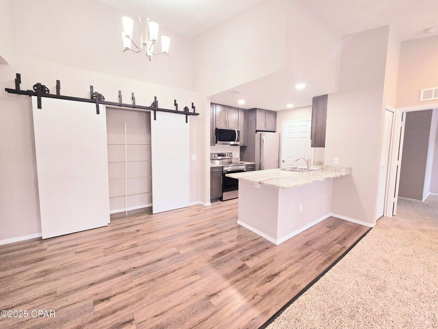 SPACIOUS 4-BEDROOM, 3-BATH CONDO IN QUIET NEIGHBORHOOD, CLOSE TO EVERYTHING! 🌟

This condo is priced to rent!✨ Vaulted ceilings make this already roomy condo feel wonderfully open and airy.

🍳 The kitchen features granite countertops, stainless appliances. The large pantry provides ample storage space. Bedrooms are generously sized, with the 4th bedroom being an ensuite - perfect for guests or a teenager. 🛏️ The Master Bedroom boasts two walk-in closets for extra storage. 👗👚

🌳 Enjoy a peaceful, beautiful community with grills and tables. 🍔🌭 A short stroll takes you to the resort-style swimming pool, and there's also a clubhouse with a full kitchen, workout facility, and playground. 🏋️‍♂️🏊‍♀️

📍 Prime Location:

Walking distance to restaurants and shopping 🍽️🛍️
Just 3,500 feet to the beautiful white sands of Panama City Beach 🌊
1 mile to Pier Park, Panama City Beach's premier outdoor shopping center 🛒
1.5 miles to Frank Brown Recreational Park, home to Gulf Coast Jam and offering sports fields, an aquatic center, trails, a fishing pond, and a dog play area 🎸🐾
Don't miss this opportunity to call this fabulous area of the Panhandle your home! 🌅
