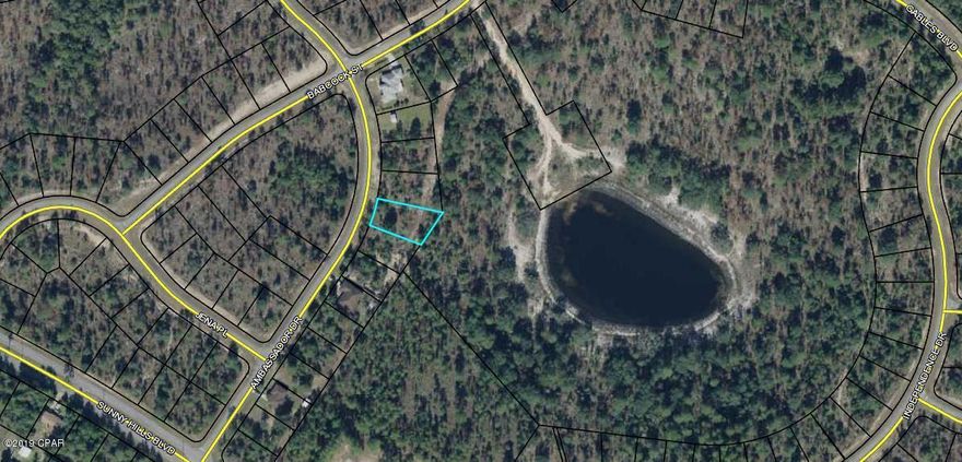 Not your typical Sunny Hills lot! Slightly over sized water view lot in a desirable area of this community. Not far off HWY 77 for that easy commute. Great spot to build your new home or invest in the future of the Florida Panhandle. Sunny Hills offers a popular 18 hole public golf course and many fine fishing and recreation lakes. Located 25 miles north of Panama City and 18 miles south of Chipley. Buyer to pay Title Insurance, Closing fee, and Doc Stamps on the Deed.