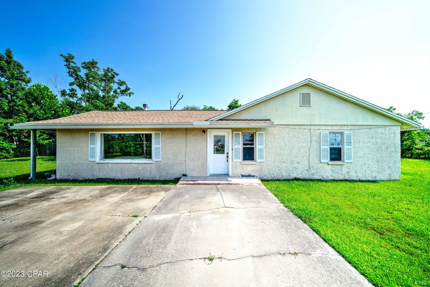 CURRENTLY UNDER CONTRACT, SELLER WILL CONSIDER BACKUP OFFER || Cozy, inviting home on an oversized lot with a POOL! Great space to host family and friends. Come through the entry way with pine ceilings and step down into the sunken living room featuring a gorgeous, large window and stone fireplace. Built in desk and bookshelf in main living area. Walk through the back door and enjoy peace and quiet on the brick paved courtyard. The kitchen features knotted pine ceilings and adorable white cabinetry with curio cabinets up top! Dining room and hallway has gorgeous updated tile. Step through the kitchen to make your way into the second living space with access to the pool. The yard and pool area  are completely fenced in with double gates on both sides. Perfect for RV parking! This home has so much potential to take advantage of : with a detached studio unit equipped with water, electric, and plumbing. Studio needs work. Maximize your investment by adding your own special touch. New roof in 2019. New pool pump in 2019. Fence installed in 2019.