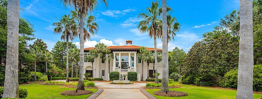 Exceptional grandeur and craftsmanship in this beautiful Burnt Pine home. If you are looking for curb appeal, you have found it. The lush manicured lawns with the sweeping circular drive has 25 enormous palm trees that welcome you into the half acre property that allow you to see golfers hitting their tee shot into the sunset on hole # 5 on Burnt Pine Golf Course. Do this while drinking your favorite beverage and watching the sunset over the water from your 400 sq. ft of screened in entertainment space from the main deck. If you are wanting privacy, this is your place. Hide away on the end of the last cul-de-sac in the subdivision to feel like you are a million miles away from the mainstream but only a golf cart ride from the Marina, Baytown Wharf, Grand Blvd and the Gulf. Gracefully capable of hosting large scale events around the oversized pool to small intimate gatherings with family and friends around the jacuzzi, just outside your wine lounge. The floor plan features ensuite bathrooms per bedroom and all burst open French doors to reveal poolside. When you need a reality break, take the elevator to your office, formal dining room, kitchen or master, all with 12 ft. ceilings on the main level (lower level has 10 fl. ceilings). When you need to roam, just go to your storage packed garage to unplug your Telsa or Golf Cart to be on your way. This is a must see for the discerning buyer.