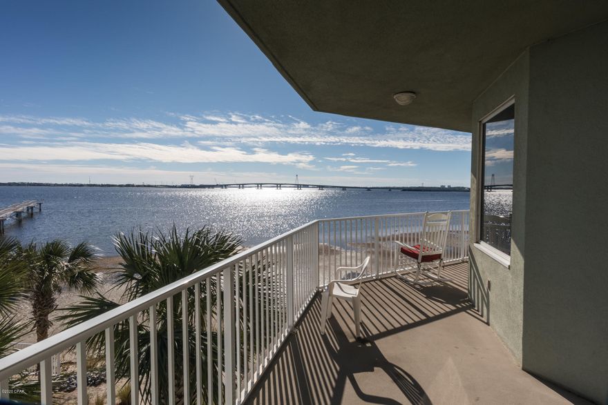 Beautiful bay-front three bedroom corner unit condo at the upscale gated community of Hibiscus By The Bay. This spacious 3 bedroom 2.5 bath, corner unit has been immaculately cared for,  full open kitchen with granite counter tops and wood cabinetry with a large pantry and huge utility room. Living room and master bedroom overlook the bay and this end unit has wrap around balcony for fantastic water views. Master suite  offers oversized walk-in closet, double vanity and jetted tub with a separate walk-in shower.  The Hibiscus community is situated on 10 acres with 600' of waterfront, a 500' pier, tennis,  pool, outside grills, a fitness room and waterfront clubhouse and meeting room. Also a private marina with slips sold separately and garages upon availability. Easy to view, call today!