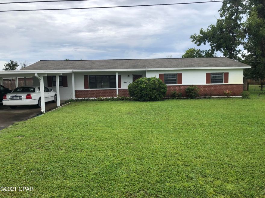 Don't miss your opportunity to own this well maintained home thoughtfully renovated after hurricane Michael. The fantastic location is close to Tyndall Air Force base, boat ramps, shopping, restaurants, and schools. This 3 bed, 2 bath home has over 1800 square feet of quality upgrades from the hardwood laminate and tile flooring to the completely redone florida room that has new windows with storm shutters on them. The large lot has a 28x60 foot work shop, built on a slab and has power to it. The sprinkler system is run off a well. The roof decking and shingles were replaced in 2019, the duct work and insulation were also replaced. and a new heat pump. Everything was done first class; even the closet lights turn on automatically when you open the doors. Contact a realtor to see it today