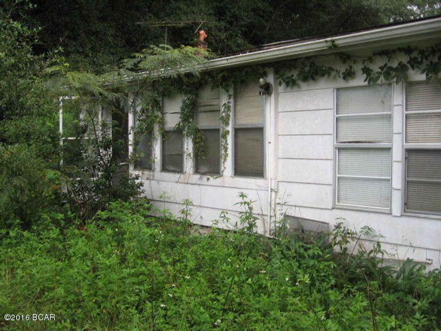 Home on lot in town. Could be great Investment Property. Needs work.