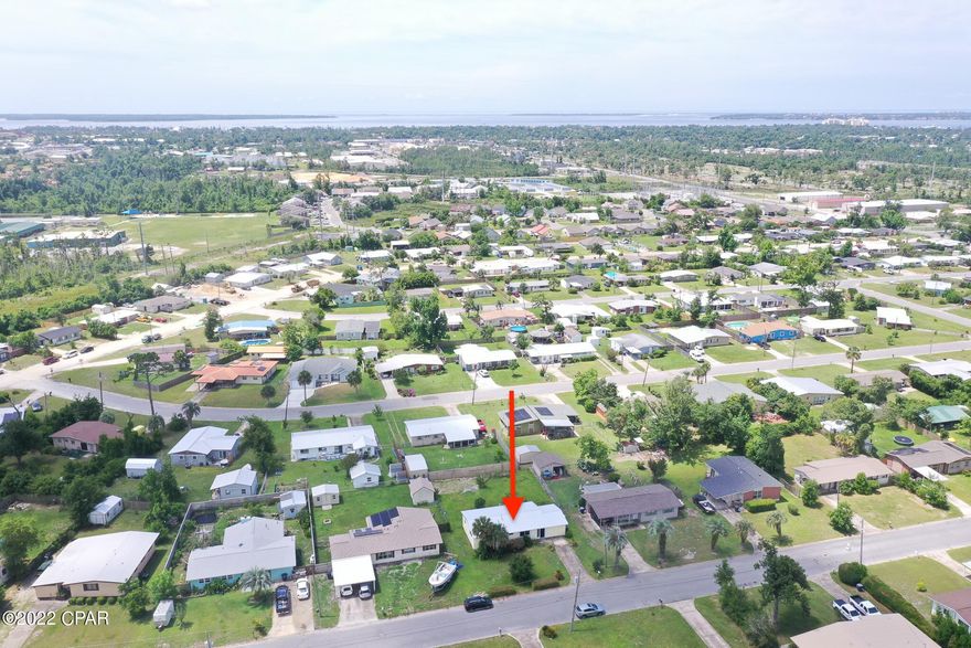 *CURRENTLY UNDER CONTRACT, SELLER WILL CONSIDER ACCEPTING BACK-UPS* MOVE-IN READY HOME in Forest Park just south of 23rd St in the heart of Panama City near everything you would need for shopping, dining, entertainment, schools and more! Four bedrooms, two full baths, and eclectic built-in cabinets and shelves in the dining area. This home has a NEW METAL ROOF, ALL NEW KITCHEN APPLIANCES, granite countertops, light fixtures, ceiling fans, flooring, paint, glass slider and more!  Large fenced back yard with multiple varieties of mature fruit trees. Only a 15 minute drive to the gorgeous water and beaches of Panama City Beach! CALL TODAY BECAUSE IT MAY BE GONE TOMORROW! Dimensions approximate please verify if important.