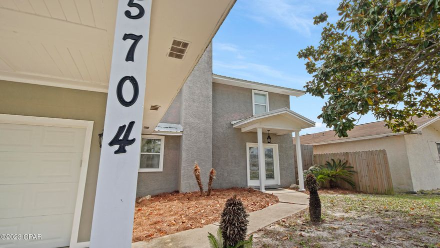 CURRENTLY UNDER CONTRACT, SELLER WILL CONSIDER BACKUP OFFERS.  Step Inside This Beautiful 2 Story Home Which Features 4 Bedrooms, 3 Full Baths, Sunroom, Inground Pool w/Outdoor Shower (Hot/Cold), Outdoor Storage Building, Single Car Attached Garage Along With Having An Attached Carport w/Tall Ceiling Height To Accommodate Larger Vehicles.  This Home Has Been Recently Updated Throughout; With Upgrades Including Beveled-Glass Double Front Doors, Porcelain Flooring, Tile Flooring (No Carpet), Hardwood Steps With Black Wrought Iron Spindles, Tiled Showers, Tall Vanities With Granite In Bathrooms, Beautiful White Shaker Cabinets In Kitchen With Granite Countertops, Subway Tile On Walls, Stainless Steel Appliances, Barn Door, Shiplap And So Much More.  Great Location - Home Situated Between The Beach & The Lagoon. Selling Furnished.  Can Be Used As AirBNB. (Actual Year Built 1984/
Effective Year Built 2014)