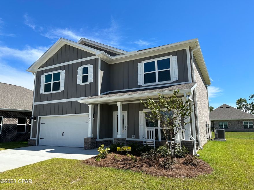 The Carol floor plan is an exceptional 5-bedroom, 3-bathroom home with plenty of space and extra storage. This one is the L Elevation, meaning the spacious 2-car garage is on the left side of the front door. As you enter this home, you will find a Flex room to the right, which can be used as a dining room, home office, study, media, playroom or a mancave! Continuing down the entry way of the home, the kitchen will be directly to the right at the end of the entry way. The family room/main living room is open and spacious connected with the breakfast nook area, which is big enough to be used as a formal dining area as well, leading to the covered back porch.

You also have a spacious walk-in Closet under the Staircase, right next to the entry to the 2-car Garage.

Upstairs you'll find a spacious bonus room, which can be used as a playroom or a media room, with bedroom 4 and 5 connected to it. The Bonus room also has a Closet for extra storage.
Bathroom 3 down the hall to the right, also leads to bedroom 3. Upstairs you also have bedroom 1, or the spacious Main Bedroom, with the Main Bathroom that has a double vanity, walk-in closet, a separate Garden tub and a separate Shower with a Glass door. There is also a Window in the Main Bathroom, giving you plenty of natural light!

Since most bedrooms are located upstairs, the Laundry room is conveniently located upstairs as well.
All countertops in the kitchen and bathrooms are granite, flooring in all the main and wet areas is the Luxury Vinyl Plank and there is carpet in all bedrooms and upstairs.
The community itself has its own Playground area for your kids, which is conveniently located further away from the main Highway.
Lynn Haven Bayou Park and Preserve is located just around 3 miles away, that has gorgeous nature trails, playground areas and a nice beach as well!