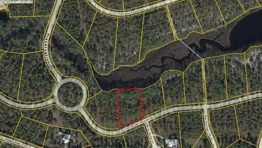 This one acre lot in Rivercamps has so much to offer...if you want privacy and a back-to-nature atmosphere then Rivercamps on Crooked Creek is for you!  Tall pines, Crooked Creek and West Bay-- Rivercamps is a gated community with amenities including pool, fitness center, walking and hiking trails, library, grill, dock with boat slips, 600' pier, kayaking, canoeing,etc.  With inventory at an all time low, now is the time to build your home.  Where else can you purchase an acre of land with all it includes?  Close to the airport and our beautiful beaches PLUS No build out time! 6336 River House lot next door for sale also.