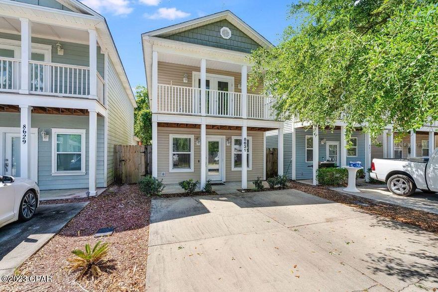 CURRENTLY UNDER CONTRACT, SELLER WILL CONSIDER BACKUP OFFERS. Conveniently located with the white sandy beaches in reach, you'll find this charming coastal cottage in the gated community of Marlin Place. With an open concept, high ceilings and modern updates, this is an extremely well-maintained home. Marlin Place has so much potential as SHORT TERM RENTALS ARE ALLOWED in this community! Enjoy this as a second home along the emerald coast and benefit from those rentals, host a long term tenant or make this your full-time residence. Walk into the great room where a spacious living area flows into the dining and kitchen. New granite countertops, range, microwave and dishwasher have been installed and new paint was recently done throughout the home! Offering a split floor plan, the master suite can be found on the main level with a large bath, walk-in closet and access to the covered patio with a small fenced-in yard. A convenient powder room in also on the main level and great for entertaining! The upper level features two additional bedrooms, one with a walk-out balcony. A full bath with new granite countertops, spacious closets and plenty of storage complete the upper level!

Enjoy the best that Florida has to offer with a community pool just steps from your front door! Homeowner dues cover lawn maintenance in the front yards, pool, garbage service and the security of the gated community. Perfectly situated just minutes to the nearby beach, you can live your best life at an incredible price! Marlin Place is centrally located to the NSA naval base, shopping, entertaining, dining and easy access to the Hathaway Bridge.