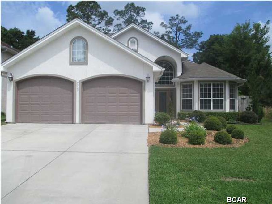 Price REDUCED on this incredible home!! THE WOW FACTOR from the moment you walk in the front door! Just a few steps in and you cannot miss the view of Callaway BAYOU directly over the bluff and right out the back door. This is one of the rare times in the real estate market that you will see a TRUE CUSTOM-BUILT home on the water at this price that is spacious, bright, and magnificent! Just a short boat ride and you are right at the GULF of MEXICO. The home boasts over 2,500 square feet with three LARGE bedrooms and two and 1/2 baths. The ceilings are high and trimmed with crown molding. There are so many windows in the home, natural light abounds in every room. The formal dining area flows into the great room and you can't miss the gorgeous fireplace and custom-built corner glass