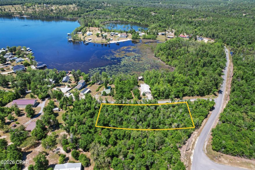 Build your dream home on this beautiful 1.26 acre lot with wonderful views of Compass Lake.  You'll enjoy NO HOA but still have access to a public boat ramp.  You'll have plenty of room for a pole barn, a large storage building,  or a future swimming pool and a backyard oasis. The possibilities are endless!  Compass Lake is a highly desirable community and the spring fed crystal clear lake is perfect for boating, jet skiing, wakeboarding, and fishing! If you love the outdoors and being in nature, then this is the perfect homesite for you.  Go and see this beautiful lot today! All measurements are approximate, please verify if important.