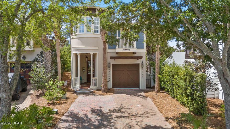 Not every beach home has to be surrounded by tourists.  Welcome to coastal elegance at 5329 Hopetown Lane, an architectural masterpiece nestled in the distinguished, established community of Martinique. From the moment you approach the stately front entry--complete with a flickering gas lamp--you'll recognize the unique craftsmanship and fine detail that set this home apart. The main level is designed for effortless living and grand entertaining, featuring soaring ceilings and an open-concept Great Room that flows into a chef's kitchen packed with abundant cabinetry and stainless-steel appliances. Bathed in natural light, the home boasts sophisticated stained concrete floors downstairs and a stunning, oval-shaped formal dining room that serves as a true conversation piece. For year-round relaxation, the fully enclosed sunroom offers a private sanctuary equipped with HVAC and a cozy gas fireplace.
The luxury continues upstairs where warm hardwood floors lead to a versatile open-concept office and a thoughtfully designed split floor plan. The primary suite is a true retreat, featuring an oversized bedroom with a tucked-away sitting area and access to two private balconies. Its spa-like ensuite is finished with double vanities, a large jetted tub, a separate tiled shower, and an expansive walk-in closet. Beyond the home's low-maintenance, private backyard, the Martinique neighborhood offers a lush landscape of walking trails, fountain-filled ponds, a pool, and a playground. Best of all, you are just a short stroll from Captain Anderson's Marina, where you can enjoy world-class dining and vibrant weekend farmer's markets.  The St Andrew's State Park, and sandy white beaches are minutes from this community.  This isn't just a house; it's a lifestyle defined by beauty and convenience.