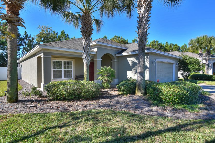 Absolutely beautiful, will maintained 3 bedroom, 2 bath home in the much desired Palmetto Trace.  This home has tile through out the entire living areas, creating a seamless flow.  The kitchen boasts stainless steel appliances and a spectacular kitchen island.  Enjoy open living concept with large living room, kitchen, and dining room with tray ceiling and pocket lighting.  The master bathroom has a large separate walk in shower and a relaxing garden tub!  A screened enclosed back porch is wonderful treat to enjoy the outdoors.  Palmetto Trace is the most conveniently located neighborhood in Panama City Beach, with Pier Park, Pier Park North AND Frank Brown Park literally located within walking distance.  This fabulous home is located around the corner from one of the pools and the back entrance to Frank Brown Park.  Make your appoint to view this home today!