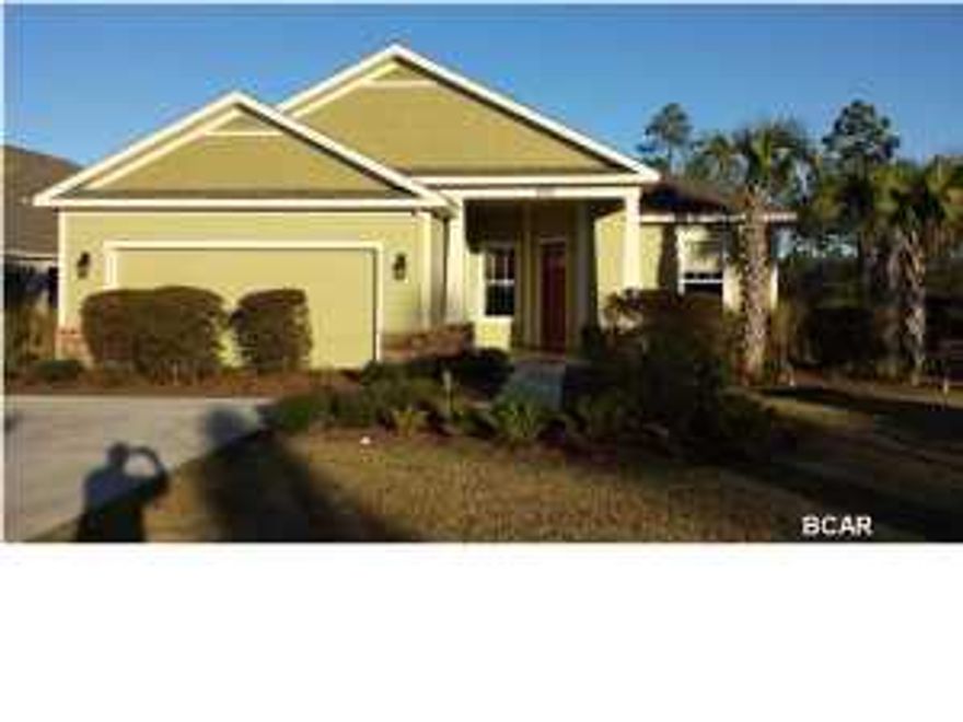 The builders of Breakfast Point have now begun phase 1 of the beautiful Whisper Dunes of Panama City Beach. Quality and craftsmanship carries throughout this home with 8' doors, over sized tiles in wet areas, granite counter tops, large baseboard molding, Moen plumbing fixtures, under mounted porcelain sinks, raised vanities in bath areas,covered back porch, two car garage, just to name a few. Energy efficient systems include R-38 ceiling insulation, R-19 exterior walls, interior wall insulation for a quite home, 14 sear high energy heat pump, and low E2 windows. This golf cart friendly community gives you the convenience of driving approximately 1 mile to the beach.