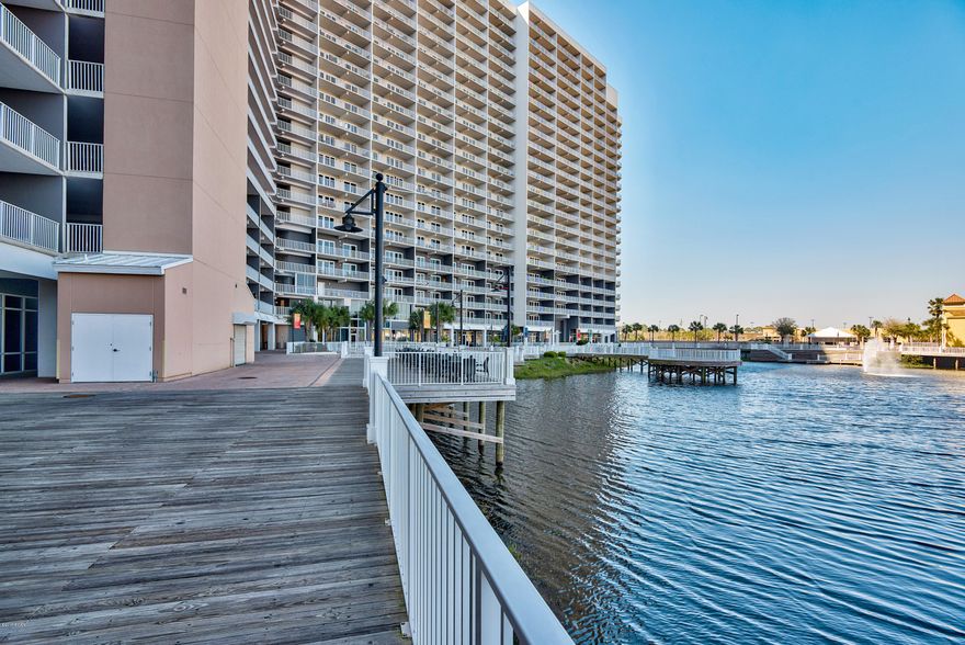 Laketown Wharf Resort Is in The Heart of All the Fun & Excitement In Panama City Beach – Just Steps Away From The World’s Most Beautiful White-Sand Beaches, Shopping, Dining & Entertainment. This Beachside Resort Offers Unparalleled Amenities with Convenient Beach Access, 5 Unique Pools, A Kids Funscape Playground, Splash Bar & Grill, Gulf View Fitness Center & Covered Garage Parking. Laketown Wharf Offers a Variety of Views Including the Gulf of Mexico, Lake & Golf Course. Enjoy the Nightly Fountain & Light Show & Market Shops Along The 52,000 Square Feet of Lakefront Boardwalk. This Residence Has 1 Bedroom, 2 Baths, Bunk Room & Can Easily Accommodate Over 6 People. Features Include: New Furniture, Flooring & Paint, Large Open Floor Plan, Expansive Wrap Around Balcony, Granite Countertops, Fully Applianced Kitchen With Breakfast Bar. Multiple Views, Floor Plans & Floor Heights Also Available! Models Open Daily From 10-4! Financing Available With Only 10% Down (Subject To Credit Approval)! Call For More Details!
